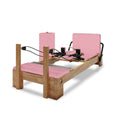 Nano Pro Lite Oak Wood Pilates Reformer – Pink | 5-Spring Home Reformer
