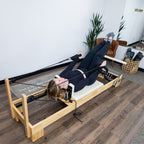 Nano Pro Lite Oak Wood Pilates Reformer – Pink | 5-Spring Home Reformer