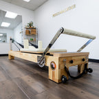 Nano Pro Lite Oak Wood Pilates Reformer – Pink | 5-Spring Home Reformer